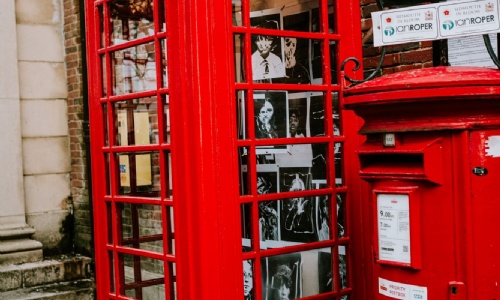 Post box and telephone box with images in as part of the Sidmouth College art CODEX project