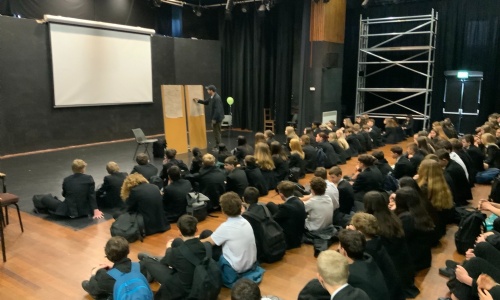 Author Steven Camden providing assembly to children at QE
