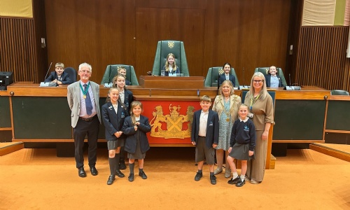 Pupils from Marine Academy Primary at the Council Chambers  stood with the Lord Mayor