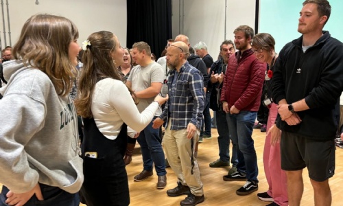 students-doing-training-with-staff