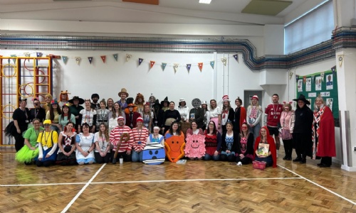 staff from whipton barton federation join in the fun at world book day