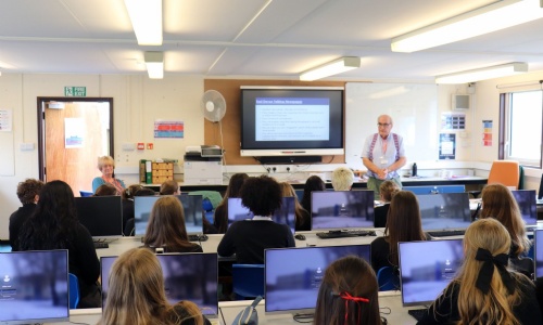 Students listening to a presentation.