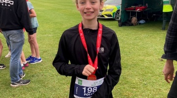 Exwick Heights Pupil Raises £768 for Wildlife Trust with First Triathlon