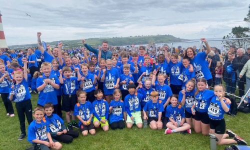 Group of students celebrating with their medals