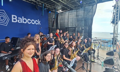 Students on stage ready to perform